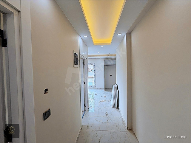 BAHÇEŞEHİRİN GÖBEĞİNDE DÜŞÜK KATLI SIFIR YAPI 2+1 AÇIK MUTFAK - Görsel 28