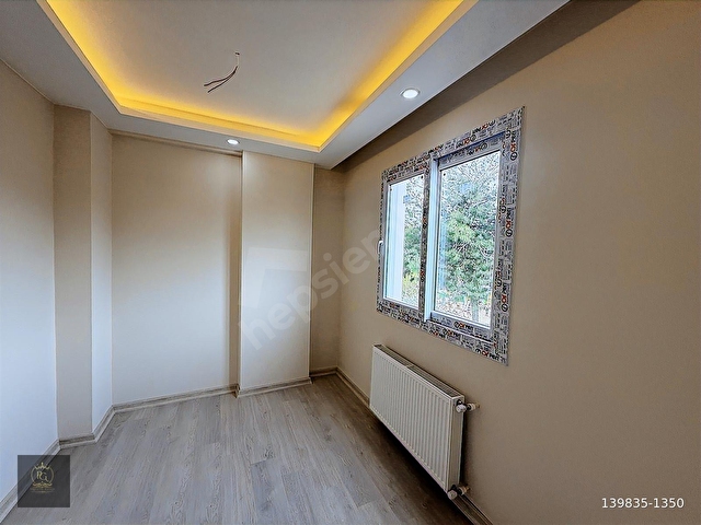 BAHÇEŞEHİRİN GÖBEĞİNDE DÜŞÜK KATLI SIFIR YAPI 2+1 AÇIK MUTFAK - Görsel 15