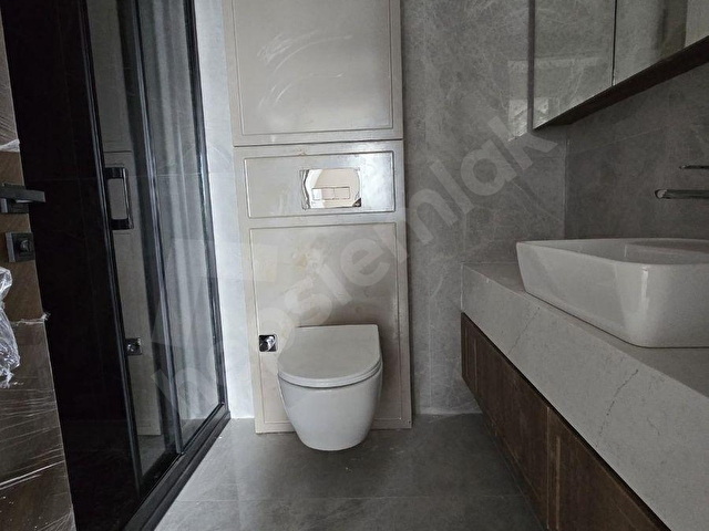 ÖZCAN EMLAK FARKIYLA GÜVENLİKLİ KAPALI GARAJLI SIFIR 3+1 DAİRE - Görsel 26