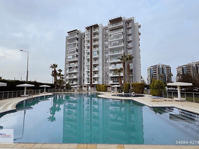 Mavişehir Bozoğlu Sitesinde deniz & havuz manzaralı kiralık 1+1