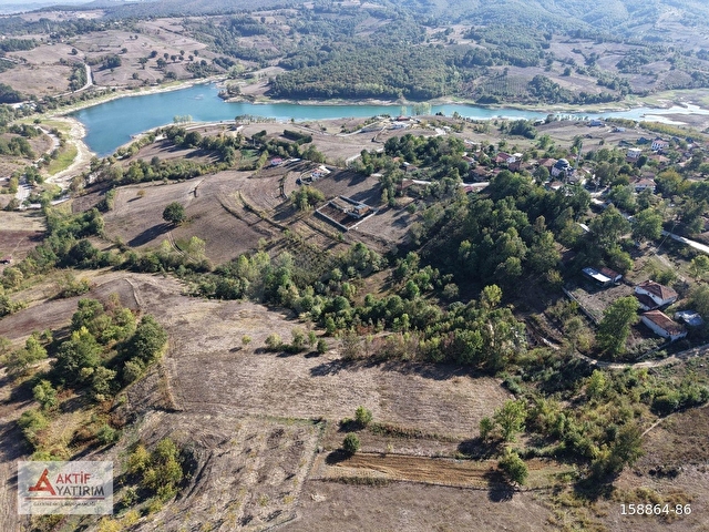 KANDIRADA ÇAPI DÜZGÜN 1.058 M2 GÖL MANZARALI YATIRIMLIK TARLA - Görsel 24