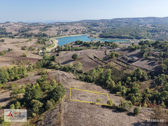 KANDIRADA ÇAPI DÜZGÜN 1.058 M2 GÖL MANZARALI YATIRIMLIK TARLA - Görsel 7