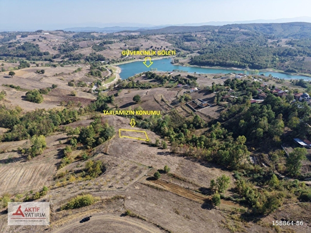 KANDIRADA ÇAPI DÜZGÜN 1.058 M2 GÖL MANZARALI YATIRIMLIK TARLA - Görsel 3