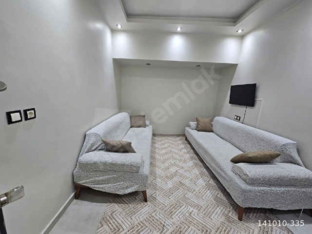 YEŞİLYURT MAHALLESİNDE NECİP FAZIL BULVARINDA 1+1 EŞYALI KİRALIK TERASLI DAİRE