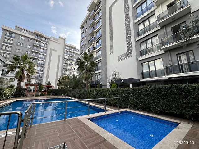 DEMİR HOUSE SİTESİNDE SATILIK 2+1 BAHÇE KULLANIMLI DAİRE