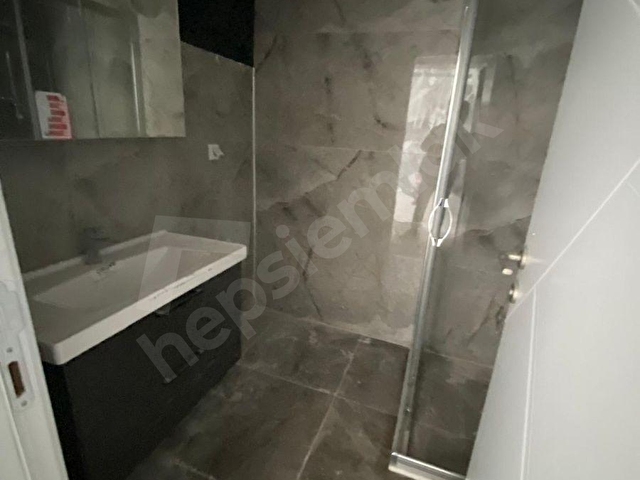 DOĞUŞ EMLAKTAN KOZLU MERKEZDE SIFIR SATILIK 1+1 DAİRELER - Görsel 10