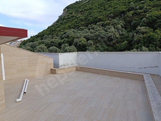 KUŞADASINDA FULL DENIZ DOĞA VE ŞEHİR MANZARALI DUBLEKS 3+1 HAVUZLU SİTEDE DAİRE FİYATINA - Görsel 22
