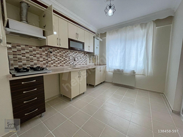 71 EVLER MAHALLESİ ERTAŞ CADDESİ ALTI KİRALIK 2+1 DAİRE