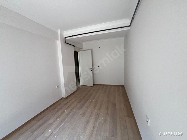 Sahibinden Karşıyaka İmbatlı’da Merkezi Konumda, Kapalı Otoparklı, Engelliye Uygun Modern Daire - Görsel 14