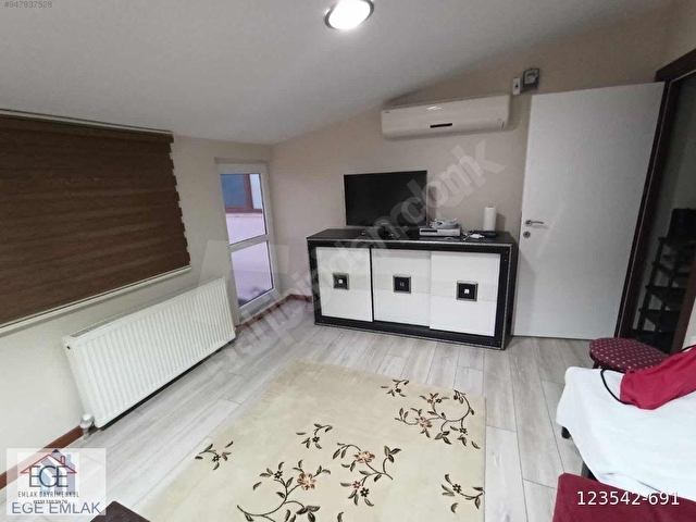 EGE EMLAKTAN KEŞAN MERKEZDE TERASLI KİRALIK EŞYALI DAİRE