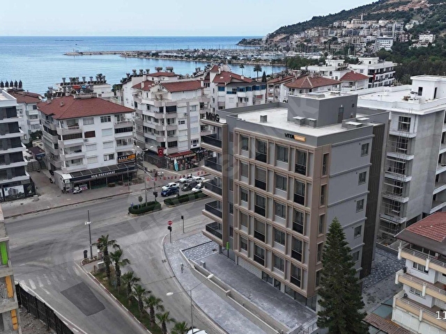 ANA CADDE ÜSTÜNDE NET 71Lİ GENİŞ 2+0 DENİZ MANZARALI DAİRE
