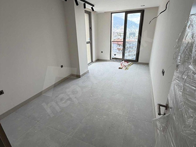 ANA CADDE ÜSTÜNDE NET 71Lİ GENİŞ 2+0 DENİZ MANZARALI DAİRE - Görsel 24