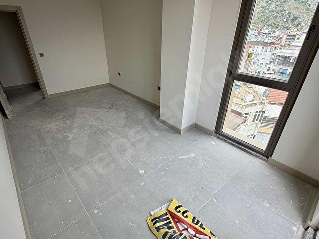 ANA CADDE ÜSTÜNDE NET 71Lİ GENİŞ 2+0 DENİZ MANZARALI DAİRE - Görsel 25