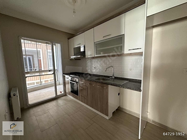 Altınkum Emlakta kat kaloriferli 2+1 90m2 satılık daire