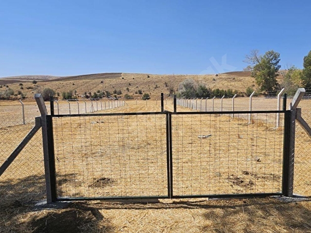KONUT ER EMLAKTAN GÖKÇEKIŞLADA TEL ÖRGÜ İLE ÇEVRİLİ 1.059m TARLA - Görsel 5