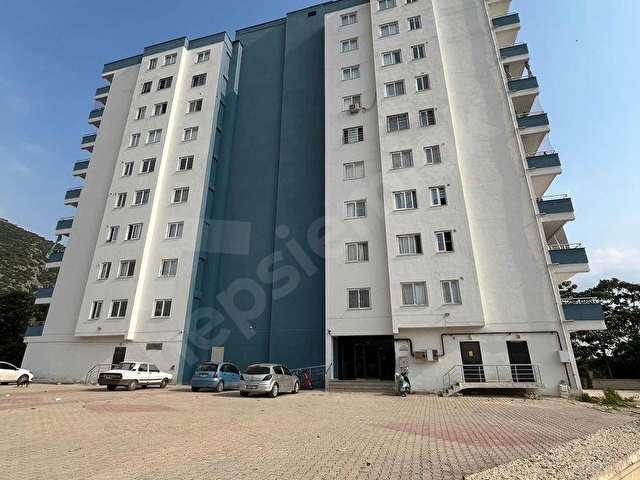 KOZAN DİVAN EMLAKTAN BİZİM TOPTAN MARKET YANINDA 2+1