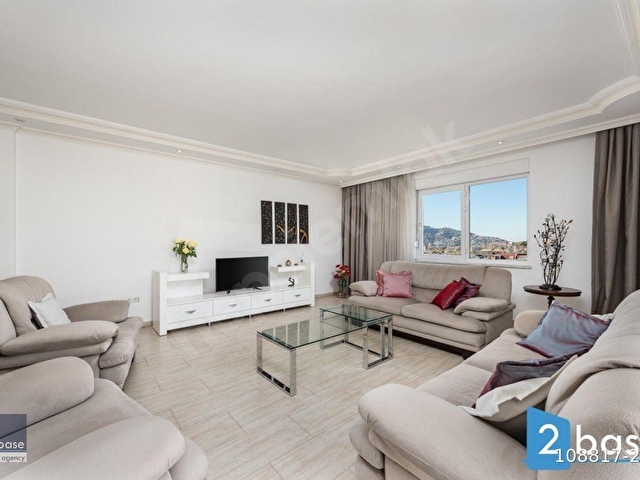 Alanyada satılık iki yatak odalı deniz ve dağ manzaralı eşyalı daire