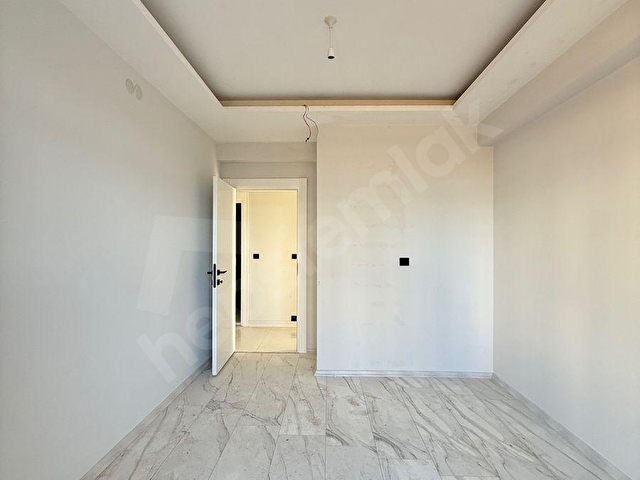 GÜLBAHÇE MAHALLESİNDE YAPIM AŞAMASINDA SATILIK LÜKS 3+1 DAİRE - Görsel 14