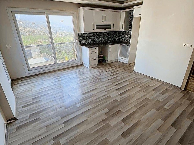 GÜMÜLDÜR DE SATILIK KISMİ DENİZ MANZARALI 2+1 DAİRE - Görsel 9
