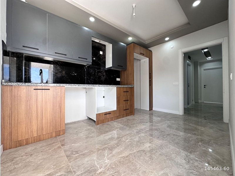 Varsak karşiyaka mah. 1.kat asansörlü 2+1 sifir i̇skanli 105m2 satilik dai̇re