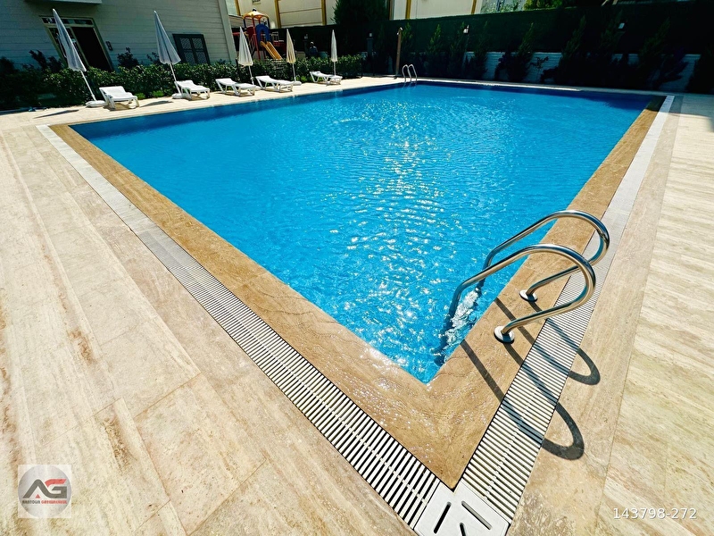 2+1 100m2 asansörlü ultra lüx havuzlu si̇te i̇çeri̇si̇nde sifir dai̇re