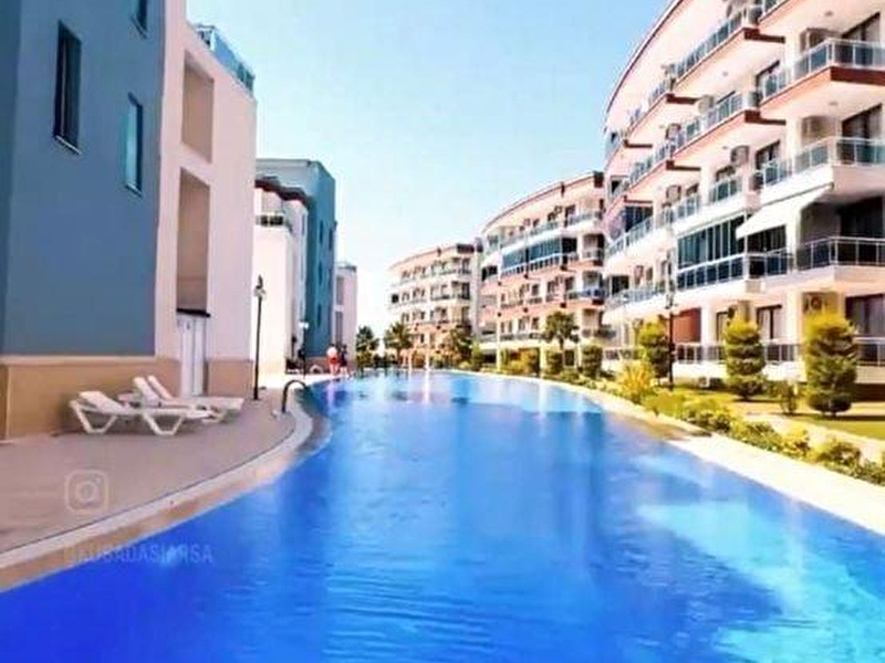 Kuşadasi değimendere'de deniz manzaralı eşyalı satılık daire