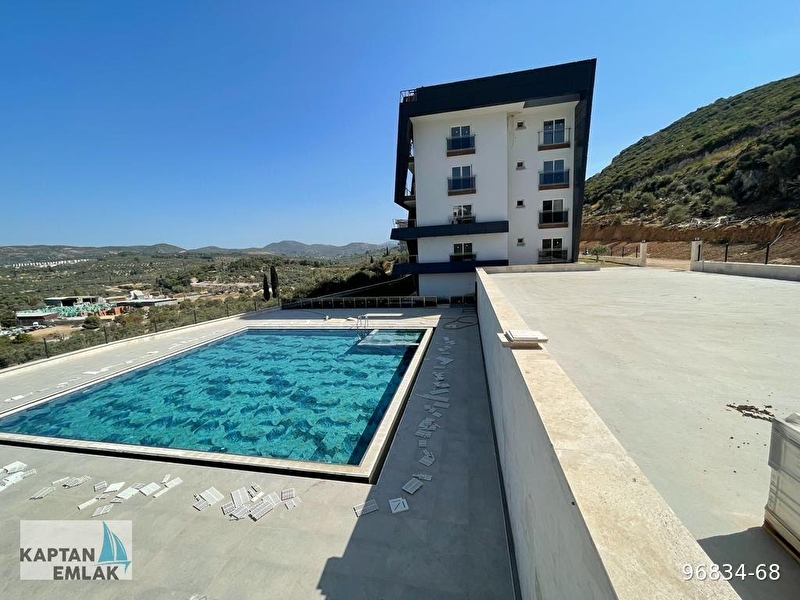 Aydin kuşadasi merkezde 2+1 deni̇z manzarali satilik dai̇re
