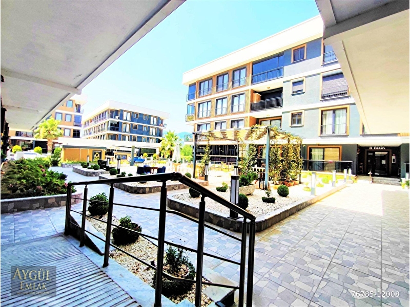 Aygül'den akçay'da nezi̇h si̇te i̇çi̇ fi̇tness salonlu kapali otoparkli ebeveyn banyolu 2+1 satilik dai̇re