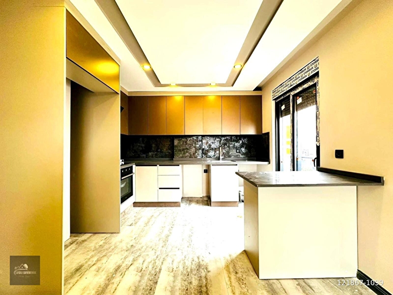 Varsak aydoğmuş'ta sifir lüks tasarim 2+1 açik mutfakli dai̇re