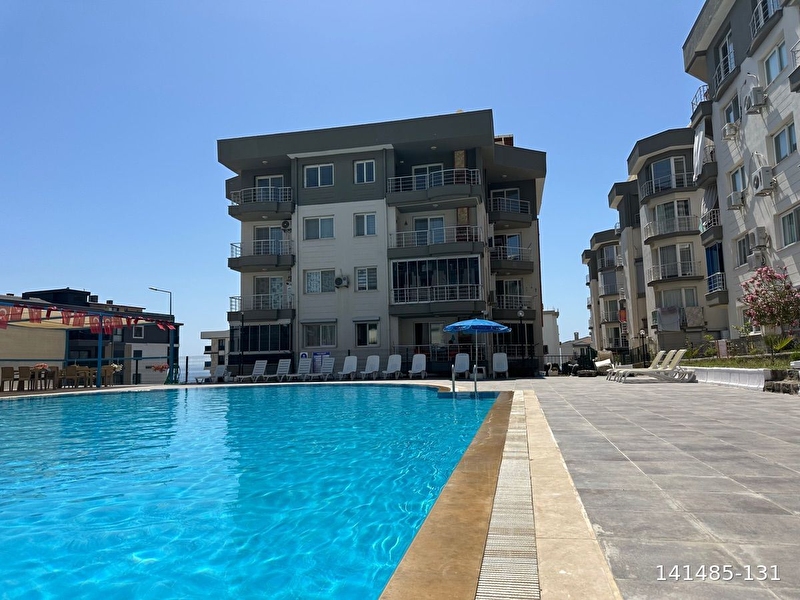 Yabancıdan havuzlu sitede full eşyalı 2+1 eşyalı acil satılık