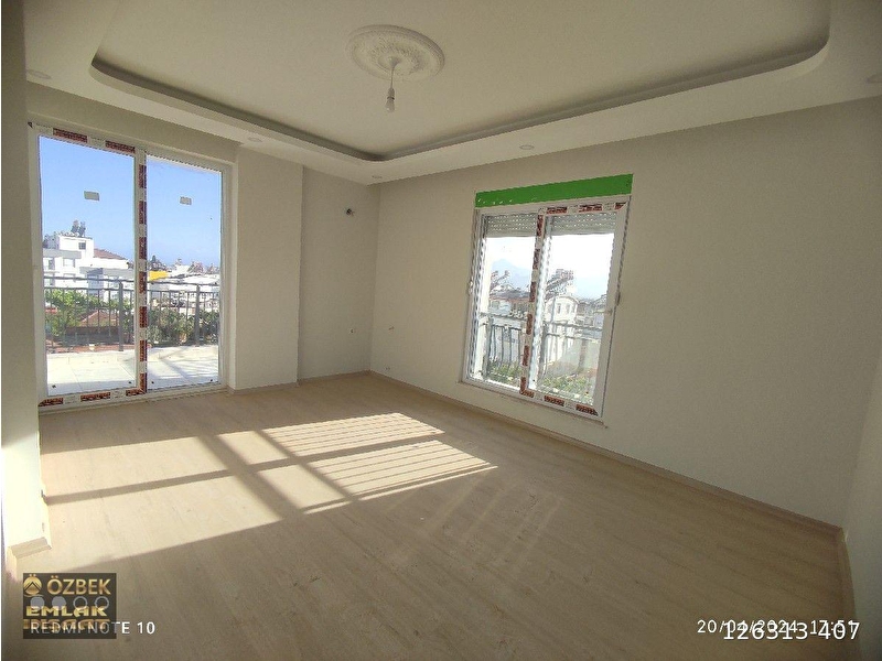 Antalya kepez erenköy de katda asansörlü 2+1 satilik dai̇re özbek emlâk i̇nşaat