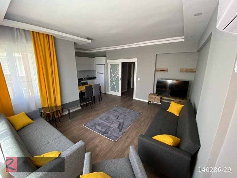 Örnekköy'de plajlara yürüme mesafesi̇nde 2+1 satilik dai̇re