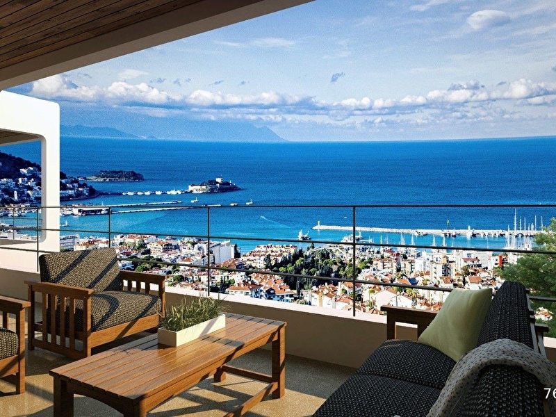 Kuşadasi mari̇nada panorami̇k manzarali garajli kalori̇ferli̇ sifir lüks 3+1 dai̇re