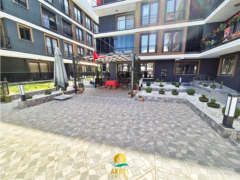 Akbaldan akçayda 1+1 ön cephe kapali otoparkli 1 yaşinda lüks satilik dai̇re