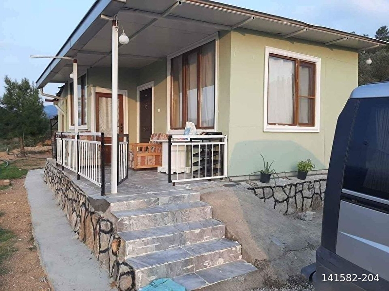 Altinoluk li̇man emlak'dan havran i̇nenönü köyünde evi̇ i̇çeri̇si̇nde satilik 1991 m2 zeyti̇nli̇k