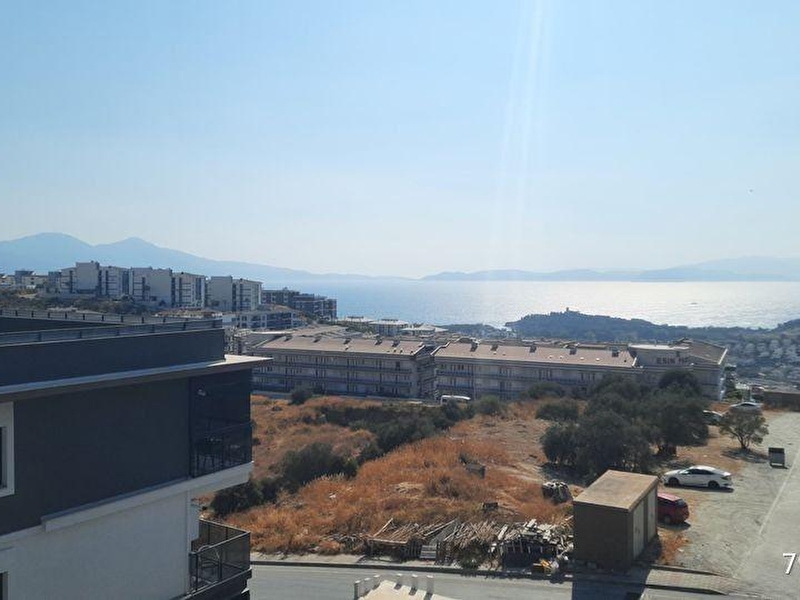 Kuşadasi sanayi ustu satilik ful deniz manzarali sifir lüks dai̇re