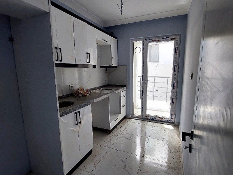 600 evlerde bahçeli 2+1 satılık daire