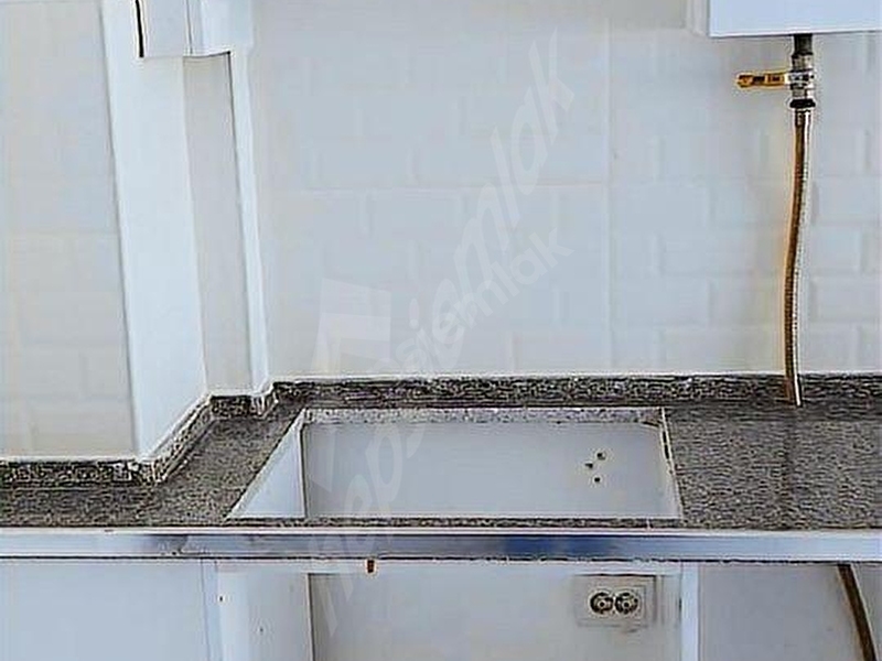 Dönüşüm Emlak'tan Çarşı Merkezde Satılık 1+1 Daire Fırsatı 