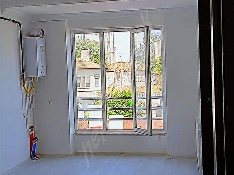 Dönüşüm Emlak'tan Çarşı Merkezde Satılık 1+1 Daire Fırsatı 