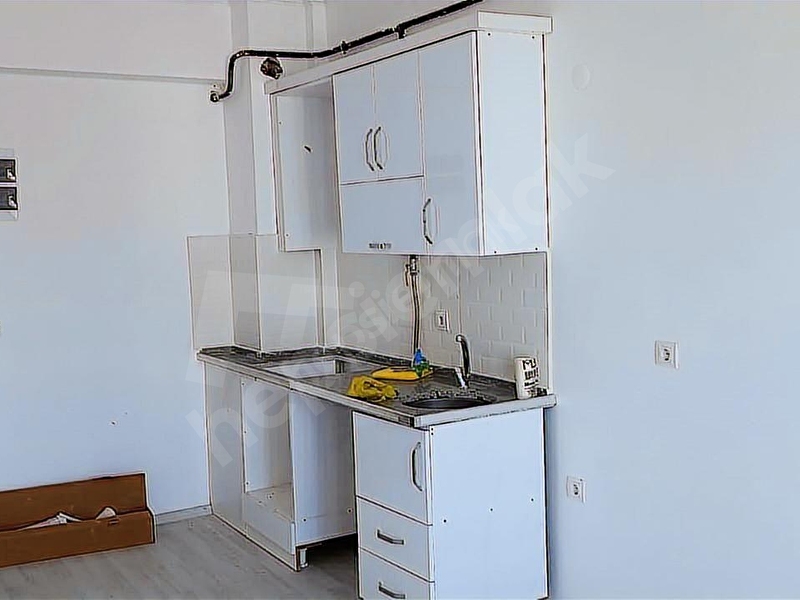 Dönüşüm Emlak'tan Çarşı Merkezde Satılık 1+1 Daire Fırsatı 