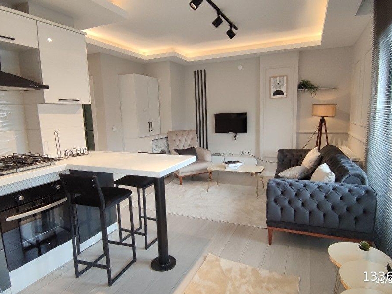 Truva'dan atakum yeni̇mahalle satilik eşyali 1+1 dai̇re