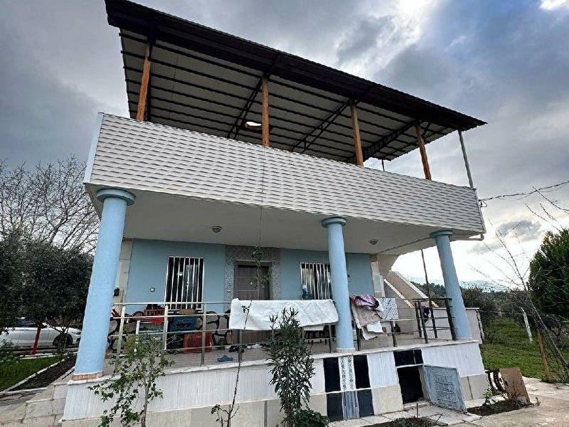 Kemalpaşa armutluda 1500 m2 tek tapu bahçe icinde evi olan hemen kullanilabi̇li̇r bahçe