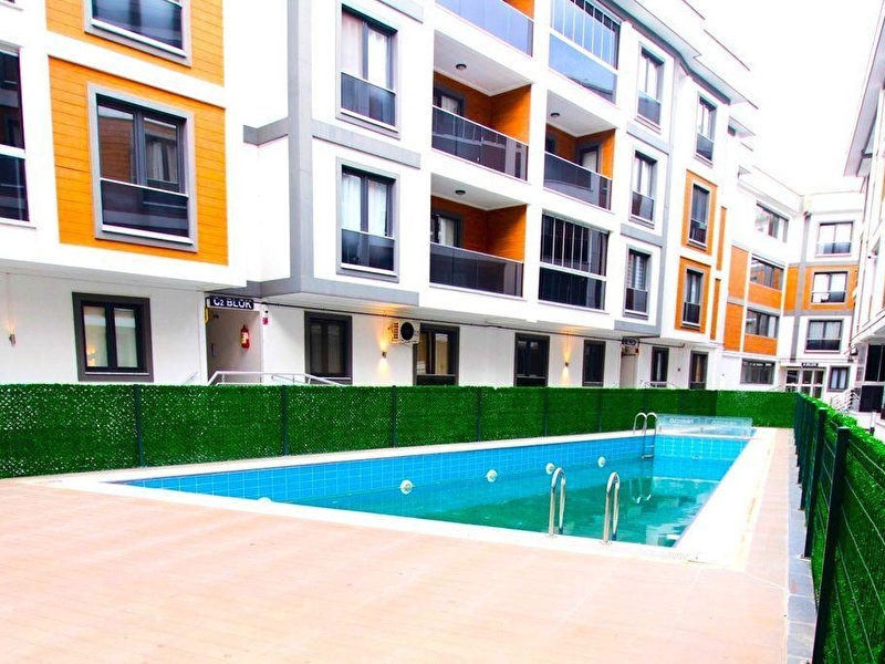 ????????melodi̇'den akçay'in presti̇jli̇ ve sağlam si̇tesi̇nde yüzme havuzlu otoparkli 1+1 dai̇re firsati