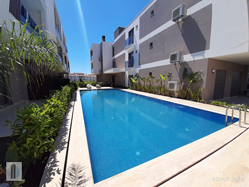 (s1650) alaçatı'ya yakın konumda, ortak havuzlu sitede, 1+1 daire
