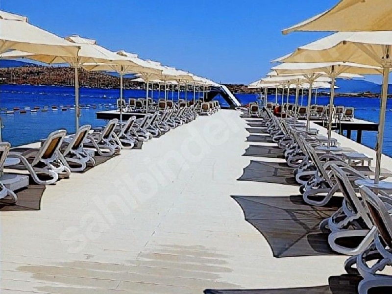 Bodrum bitez özel plajli i̇skeleli havuzlu sitede satılık full deniz manzaralı 3+1 bahçe dublexi