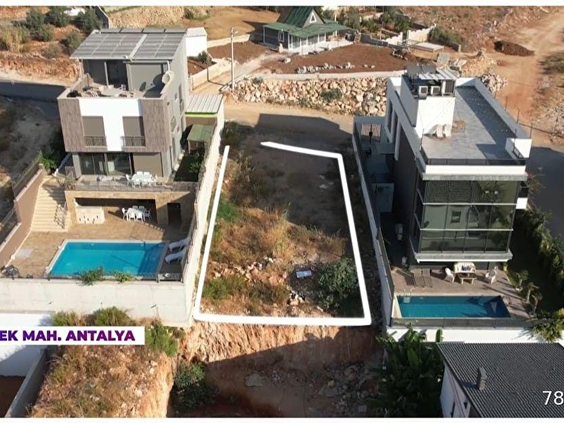 Antalya ermenek mahallesi̇ satilik önü kapanmaz deni̇z ve oteller bölgesi̇ manzarali vi̇lla arsasi