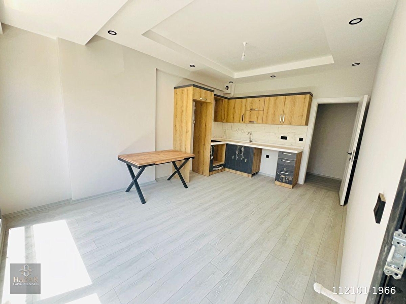 Kuşadasi davutlarda satilik arakat yatirimlik 1+1 dai̇re
