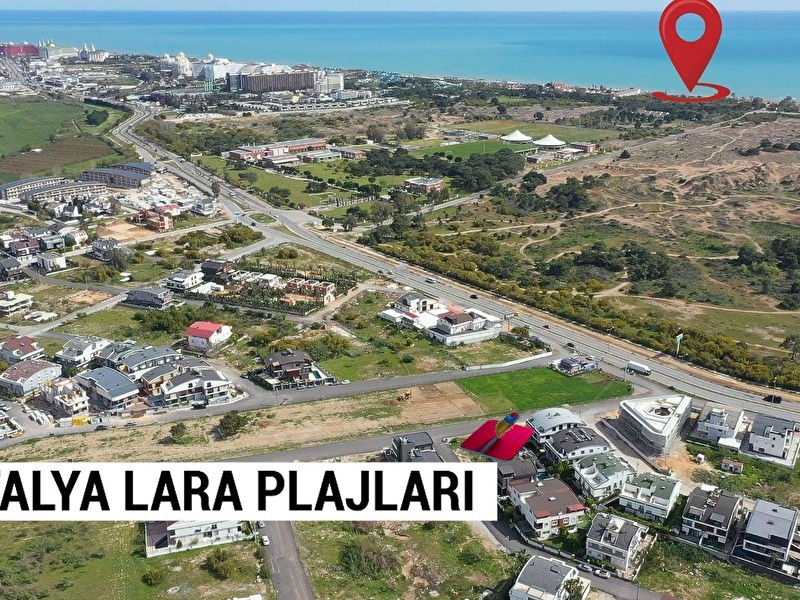 Antalya güzeloba martili bölgesi̇nde turi̇zm yoluna 50 mt  529 m2 satilik vi̇lla arsasi