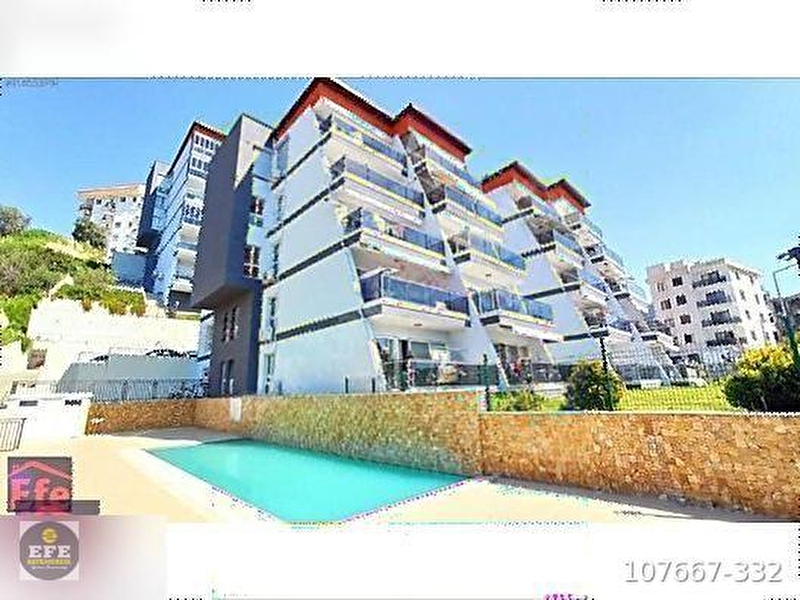Efe gayri̇menkul'den kuşadasi ege mah.de bahçeli̇ satilik dai̇re