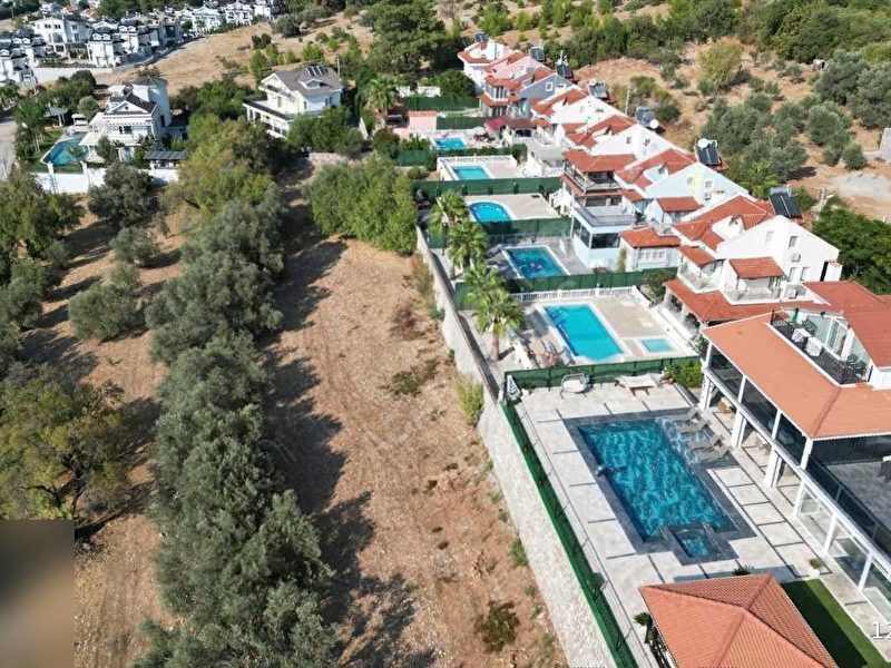 Dünyaca ünlü ovacik muhtaşem manzarali 932 m2 i̇marli arsa